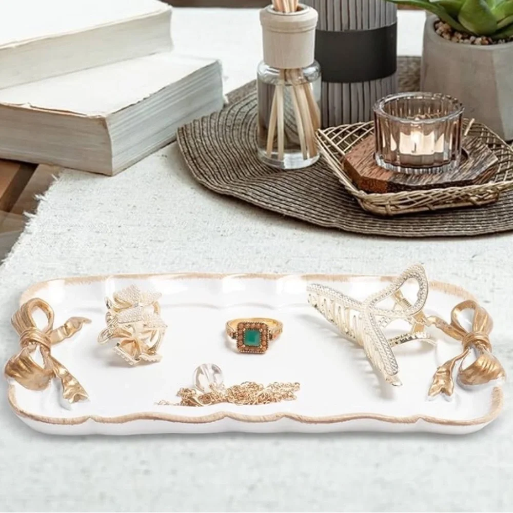 Jewelry tray with gold bows coquette style